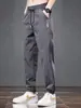 Calça Casual Masculina Primavera e Outono Marca da Moda Calça Reta Solta Cor Cáqui Joggers Tendência Versátil Esportiva Calça Longa Masculina