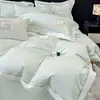 Estilo luxo leve conjunto de quatro peças bordado 100S algodão de fibra longa de Xinjiang, capa de edredom bordada de alta qualidade 100% algodão, lençol, conjunto de cama