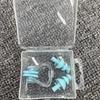 Set de tapones para los oídos y pinza para la nariz para natación Equipo F para ahogarse en agua Tapón para los oídos de silicona F Caja para tapones de nariz de natación al por mayor