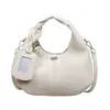 Yaozi 2026 otoño temprano nueva moda versátil casual simple bolso de hombro con textura retro, adecuado para ir al trabajo, se puede llevar en la mano o cruzar.