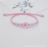 Pulsera de Moda de Venta Caliente Transfronteriza con Flores Reales, Flores Secas, Flor de Narciso, Cuentas de Grieta de Hielo de Jingdezhen, Pulsera Tejida de Amistad de Verano para Mujeres