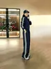 Conjunto esportivo casual estilo europeu para mulheres, nova coleção outono 2026, conjunto de duas peças da moda com cardigã e calça de perna larga para baixinhas