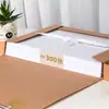 Envío gratis Caja de archivo de papel kraft Deli 63205 63206 63207 63208 caja engrosada para almacenamiento de documentos
