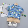 Novo Conjunto Estiloso de Duas Peças de Manga Curta para Meninos, Item Popular de Comércio Exterior, Camisa de Dinossauro Atacado de Fábrica, Roupa de Verão para Crianças Pequenas