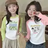 Nova Camiseta de Algodão Puro com Manga Longa para Meninas Primavera/Outono 2026 Roupa de Outono Estilo Coreano Camiseta Cartoon Curva Infantil Camada Base Ins