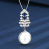 Popular Explosivo Zhuang Shengsheng Joyería Cobre Chapado en Oro Árbol de Navidad Perla Blanca traje Femenino 16-12mm