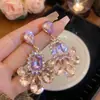 Pendientes de borla de cristal con perlas y flores de aguja plateada, pendientes de temperamento de moda francesa, pendientes de nicho de alta gama, venta al por mayor para mujeres