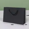 Bolsas de Regalo de Papel Negro para Venta al por Mayor Transfronteriza, Bolsas para Empaquetar Joyería, Bolsas Tipo Tote Negras Listas para Usar, Productos Exquisitos Suministrados Directamente por los Fabricantes