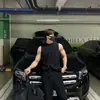 Conjunto deportivo estilo americano de chaleco y shorts para hombre, camiseta sin mangas de fitness de verano de moda, elegante y musculoso, camiseta sin mangas