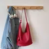 Bolso tipo cubo casual de moda estilo coreano 2026, textura de nicho, versátil para llevar al hombro y cruzado, bolso de mano de gran capacidad