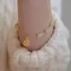 Nuevo diseño de corte Pulsera de campana de jade Hetian para mujer regalo personalizado año nuevo mujer Hanfu lujo ligero