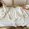 Nuevo conjunto de ropa de casa sin costuras de algodón puro con Lycra para niños, conjunto de pijama de otoño de dibujos animados Clase A para niños y niñas