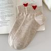Calcetines cortos blancos finos de primavera para mujer, diseño "Sensación Luo Kou Love", calcetines de algodón peinado que absorben el sudor y no producen mal olor.