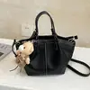 Bolso Cruzado de Hombro de Moda Coreana Transfronterizo de Gama Alta Bolso de Mano de Lujo Ligero de Temperamento Simple Bolso Cubo Elegante de Color Sólido