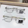 Gafas de prescripción que cambian de color con diseño de cielo estrellado, Gafas sin montura que bloquean la luz azul, Gafas de prescripción fotocromáticas grises con montura cuadrada de metal transfronteriza
