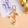 Criativo Pérola Shell Chaveiro Concha de Metal Chaveiro Pingente Ins Estilo Menina Coração Amor Bolsa Pendurado Ornamentos
