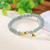 Yilu Plata de Ley S925 Chapado en Oro Jade Azul Agua Hoja de Bambú Cuentas Redondas Lujo Ligero Sensación de Alta Gama Elegante Pulsera