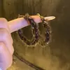 Pendientes Redondos de Punto de Lana Aguja de Plata, Pendientes de Moda y Personalizados, Lujo Ligero, Pendientes de Gama Alta y Versátiles al por Mayor para Mujeres