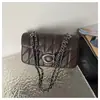 Bolso de axila baguette con puntada de diamante para mujer 2026 nuevo versátil cadena retro bandolera individual cruzada bolso de lujo ligero