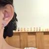 Transmisión en Vivo de Douyin Suministro Transfronterizo Pendientes de Circonita de Cristal Morado Estilo Coreano Pendientes de Moda Europeos y Americanos Fábrica
