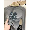 Camiseta de Manga Larga de Algodón Puro con Hombros Caídos de Moda Primavera 2026 para Mujer, Top Versátil Moderno Juvenil Elegante con Estampado de Espiga de Pescado