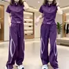 Conjunto de moda callejera para mujer, estilo coreano moderno, conjunto de dos piezas casual deportivo de alta gama con pantalones anchos de manga corta