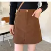 Saia Média Estilo Coreano Feminina 2026 Outono/Inverno Nova Cintura Alta Emagrecedora Saia Evasê Justa no Quadril Design Saia Curta de Veludo