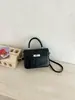Bolso Transfronterizo Textura Retro Bolso Tote Pequeño para Mujer 2026 Nuevo Bolso Cuadrado Pequeño Simple Bolso Versátil de Hombro Cruzado Moderno