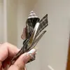 Pinza para el pelo de estilo coreano para otoño e invierno, con diseño de oso flocado y lazo, de tela a cuadros, estilo pinza lateral, adecuado para sujetar el flequillo o mechones sueltos