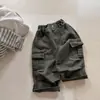 Otoño 2026 Huzhou Zhili Ropa Infantil Estilo Coreano Algodón Lavado a la Primavera Pantalones Cargo para Niñas y Niños 7560