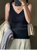 Camisola de punto con cuello en V para mujer de primavera y otoño, diseño escotado, acento en la clavícula, adecuada para usar en capas, elástica, sin mangas, top básico