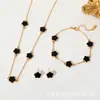 Conjunto de Collar, Pulsera y Pendientes de Trébol de Cinco Hojas de Venta Caliente Transfronteriza Moda Gama Alta Nicho Flor Única Cara Madreperla Joyería