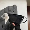 Bolsa Feminina de Nicho Super Popular 2026 Nova Tendência Moda Primavera Versátil Bolsa de Ombro de Alta Qualidade Bolsa Transversal Tipo Balde