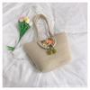 Bolsa de paja para vacaciones en la playa estilo western popular bolsa tote femenina 2024 Nueva bolsa de hombro tejida de gran capacidad para la costa