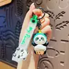 Llavero de cuerda de mano de panda giratorio creativo para coche, colgante de dibujos animados lindo para mochila escolar de estudiante, regalo pequeño para parejas de celebridades de internet
