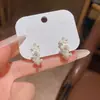 Brincos de Tarraxa Florais em Forma de C com Temperamento Doce Estilo Coreano para Mulheres Luxo Leve Nicho High-end Versátil Brincos de Temperamento Acessórios de Orelha de Celebridade da Internet