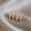 Brincos da Moda Estilo Coreano Mais Vendidos Novo Modelo Brincos Femininos Simples e Elegantes Versáteis Tiktok Mesmo Estilo Tarraxas Atacado