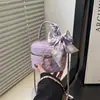 Bolsa Infantil 2026 Nuevo Estilo Bufanda de Seda Lazo Mini Bolso Cubo Estilo Chanel Bolso Cruzado Pequeño con Cadena Estilo Callejero para Niñas