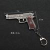 Llavero Masalati GT periférico de juego peace elite cabeza de tres niveles mochila sartén colgante uña de tres niveles