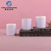 En stock juego de sellado a prueba de fugas con tapa redonda recta de 24 dientes tapa de doble capa para botella material de embalaje tapa de plástico para botella de agua loción desmaquillante cosmético