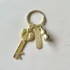 Chaveiro de Liga de Wudi Qian Wenchang Tower Pen Pixiu de Baixo Preço Abridor de Cofre Cabaceira Agitar Áudio e Vídeo Produtos de Bem-Estar