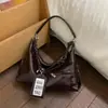 Bolso Bandolera de Moda para Mujer 2025 Estilo Caliente Moda Nicho Cuero Suave Bolso de Hombro para el Trabajo Retro Versátil Bolso de Axila Transfronterizo