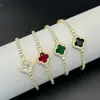 Nuevo Pulsera de Broche de Cuatro Hojas Redondo Completamente Diamantado Micro Pavé de Circonita Cadena de Tenis Diseño de Nicho