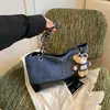Bolso hobo de mezclilla azul vintage para mujer 2026 nuevo nicho patchwork de un solo hombro color block tipo almohada versión coreana