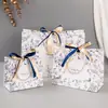 Bolsa de Regalo Estilo Nuevo Bolsa de Papel Transfronteriza Color Retro Lazo Bicolor Bolso de Mano Empaque Festivo Bolsa de Regalo Regalo de Acompañamiento