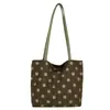 Bolsa Tote de Camurça Pelúcia Bolinhas Retro Nicho Outono/Inverno 2026 Versátil para Mulheres para o Dia a Dia de Mão ou Ombro