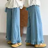 Pantalones vaqueros anchos de otoño para niña, nuevo estilo holgado, versátiles y elegantes con volantes, adecuados para niños mayores.