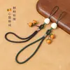 Nuevo Estilo Colgante para Teléfono Móvil Ruyi de Caqui Correa Corta para Muñeca Hombres y Mujeres Llavero con Colgante de Caqui de Vidrio Placa Antiperdida