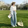 Estilo nuevo de verano, proporción áurea, retro americano, tono azul claro bosque, jeans de cintura alta tipo guadaña para mujer, pantalones anchos holgados
