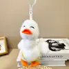 Muñeco de Pato Animador de Dibujos Animados Colgante Muñeca Linda Colgante para Mochila Escolar Llavero Regalo Pequeño Juguete de Peluche